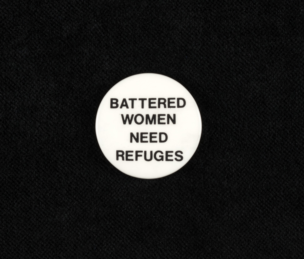 'Battered Women Need Refuges' badge Media credit University of Leeds