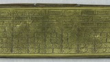 Brass case, probably designed as a calendar but at one time owned by Gypsies, With hinged lid, hinge of copper with white metal nails.