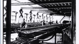 Self-acting mules for spinning woollen yarn at Gillroyd Mills, Morley, 1930s. Associated with the series of photographs used to illustrate "Life and Tradition in West Yorkshire" (1976), cp.plate 35.