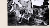 Mr F. Shields, tinsmith of Redmire, Wensleydale, soldering handles onto a backcan. Image used for one of the photographic illustrations in "Life and Tradition in the Yorkshire Dales" (1968), plate 183