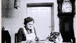 Mrs H. Kirkbride, Town Head Farm, Askrigg, Wensleydale, making a hooky rug. Image used for one of the photographic illustrations in "Life and Tradition in the Yorkshire Dales" (1968), plate 50