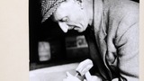 Mr Jim Peacock, stonemason of Castle Bolton, using a small lettering chisel and a mash hammer to carve his trademark. Image used for one of the photographic illustrations in "Life and Tradition in the Yorkshire Dales" (1968), plate 190