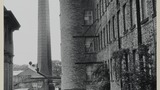 The mill yard at John Foster and Son, Black Dyke Mills, Queensbury. Image used for one of the photographic illustrations in "Life and Tradition in West Yorkshire" (1976), plate 22