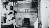 Mrs K.Barker in the kitchen at Quarry Farm,Glaisdale, showing the witchpost in position. Image used for one of the photographic illustrations in "Life in the Moorlands of North-East Yorkshire" (1972), plate 13. (Page reference taken from the new edition,