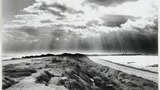 Spurn Head, showing the sea on the left, the River Humber on the right and the lighthouse in the distance (a second copy). Image originally used as one of the photographic illustrations in "Getting to Know Yorkshire" (1964) plate 3, below