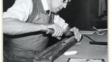 Mr B Hirst of Peter Conacher and Co., Huddersfield, soldering an organ pipe. Image used for one of the photographic illustrations in "Life and Tradition in West Yorkshire" (1976), plate 116