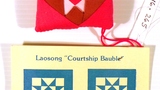 Laosong courtship bauble [quilted holiday ornament]