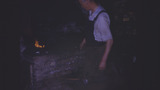 Blacksmith Heating a Horseshoe