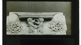 Misereres, Ely, B Two men wresting, one man has the other by the wrist L. Whorl of 8 splayed leaves R.